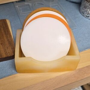 Elegant White and Orange Coaster Set